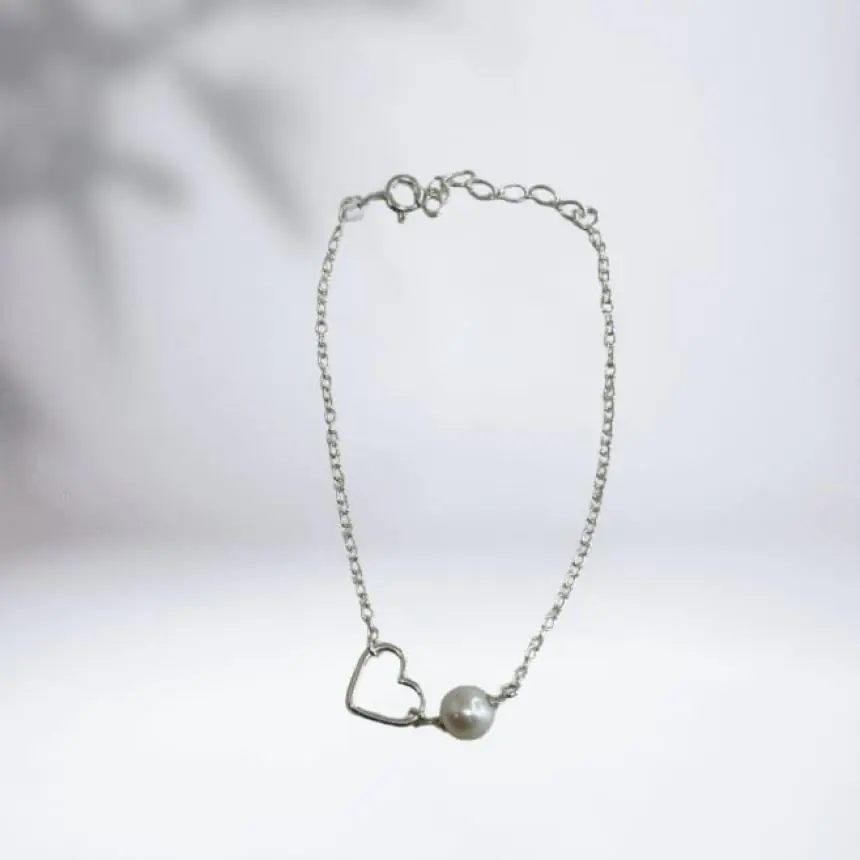 Pulseira coração vazado e perola
