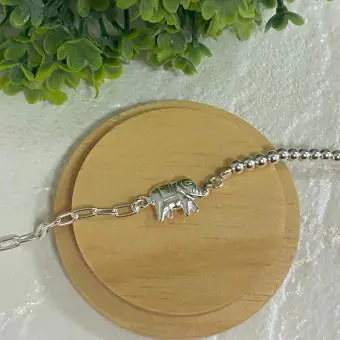 Pulseira bola prata e elos elefante central