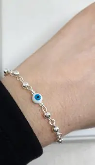 Pulsiera olho grego e  bolas