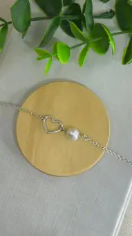 Pulseira coração vazado e perola